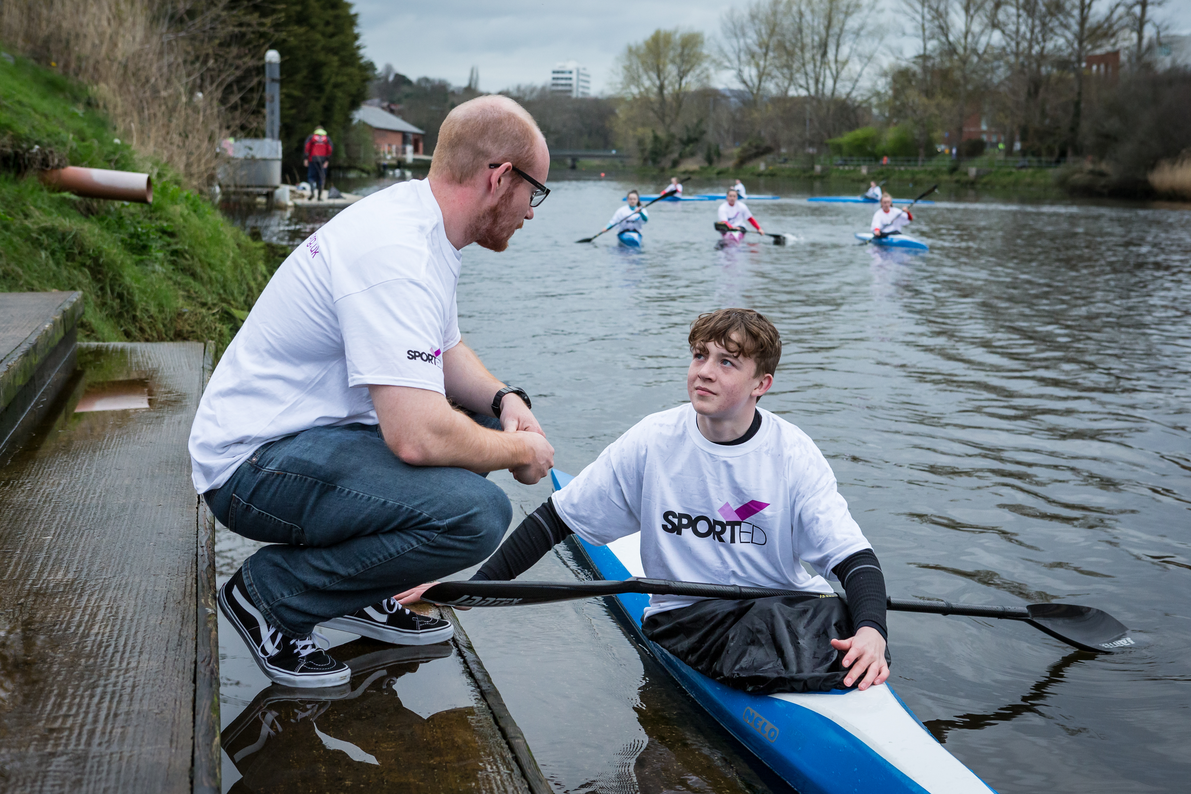 Young people kayaking with Sported charity