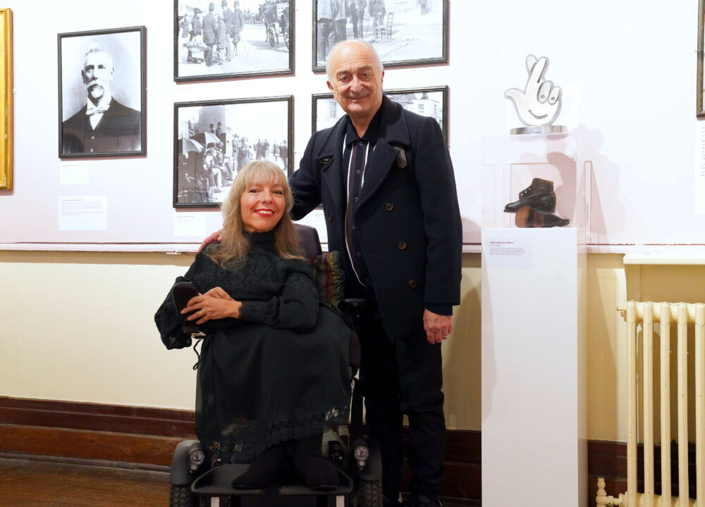 Esther and Sir Tony Robinson with the National Lottery Award