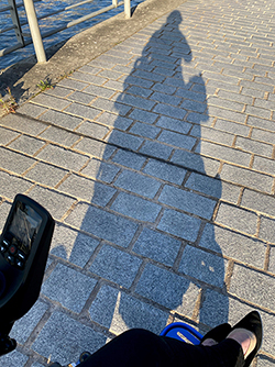 Person's shadow on a walkway