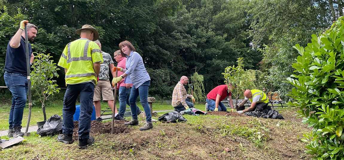 People planting trees