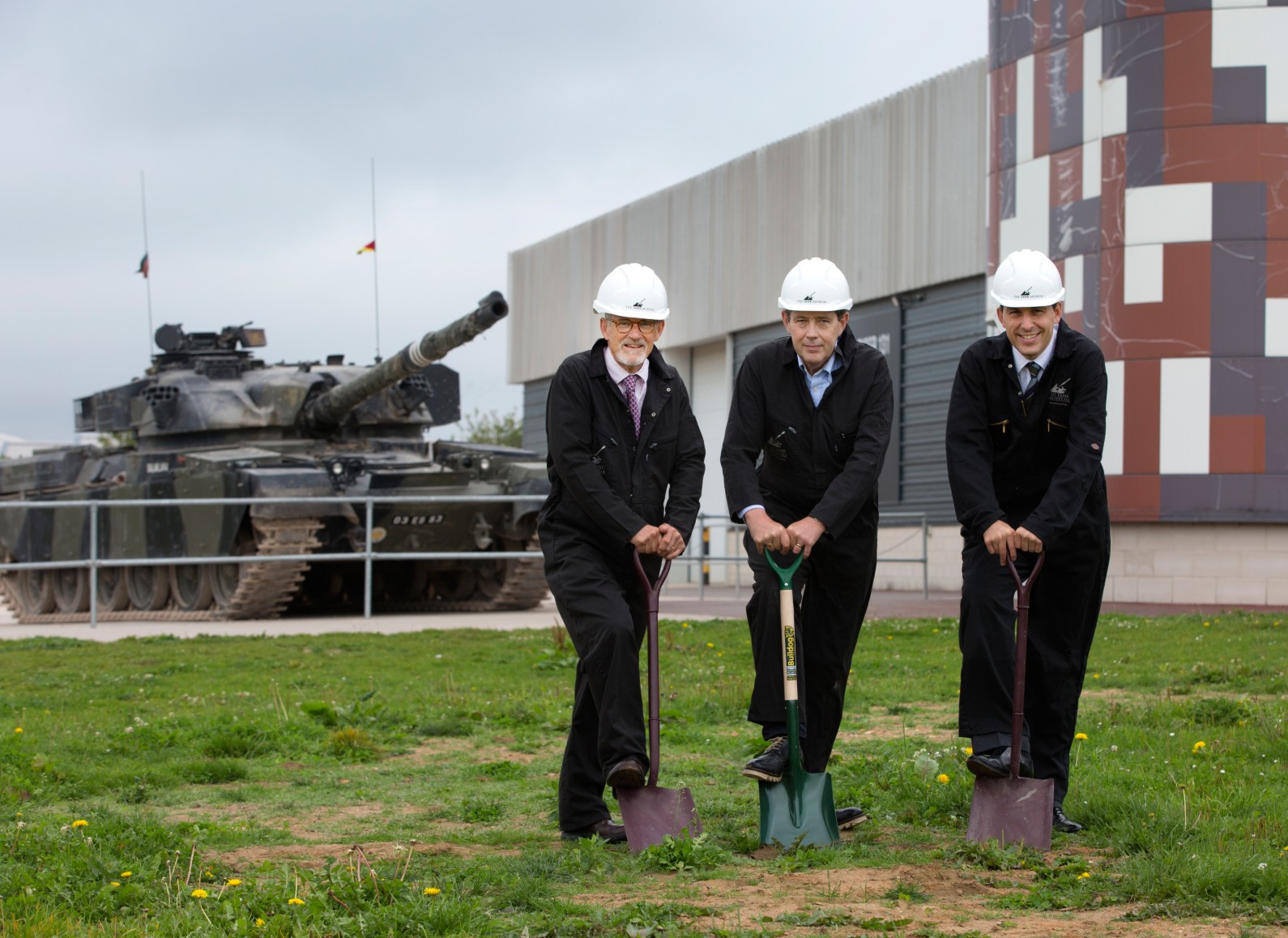 Three men digging