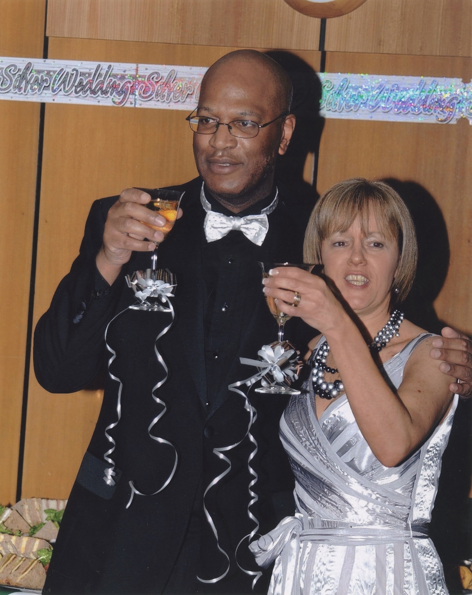 Mixed-race couple of toasting at wedding