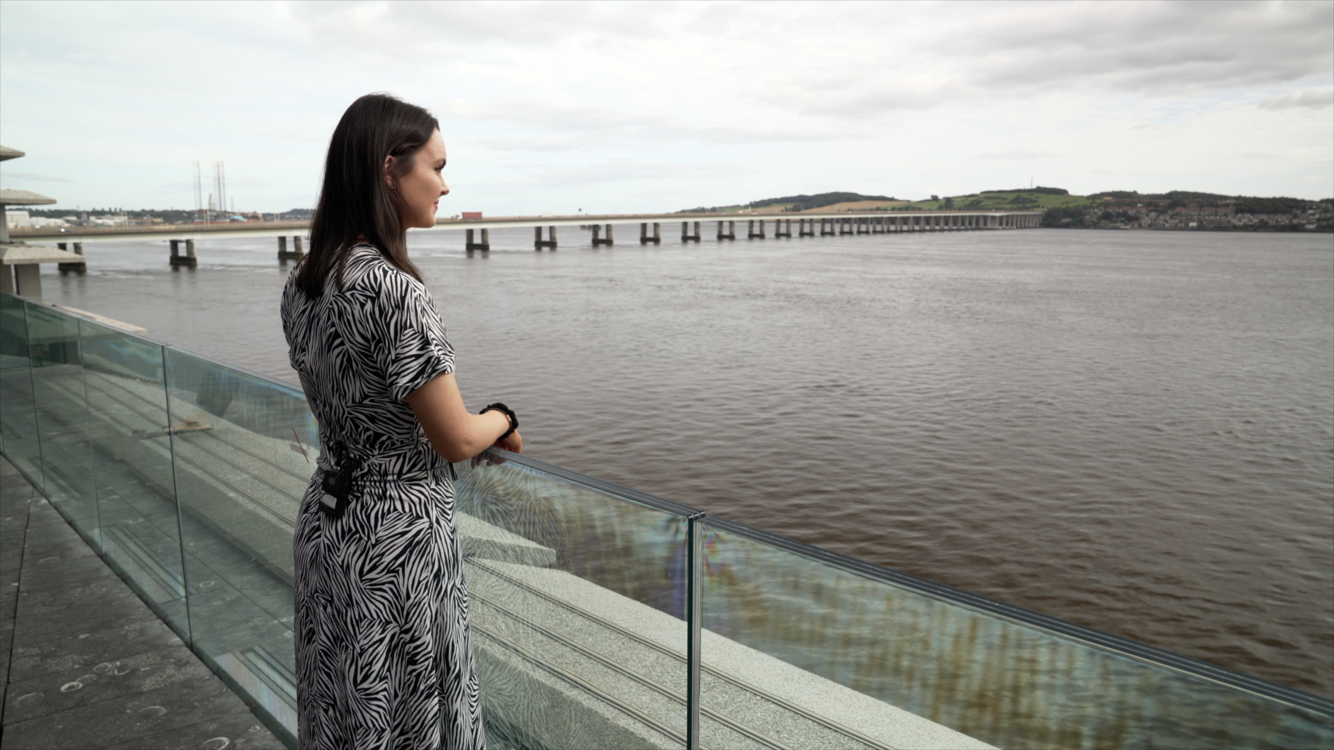 Woman looking out over the river