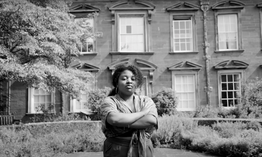 Girl in front of house