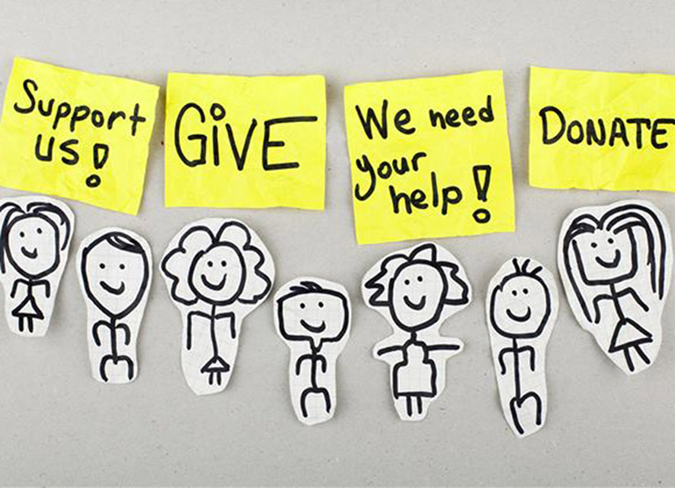 Post-its with: 'Support us', 'Give', 'We need your help', 'Donate'