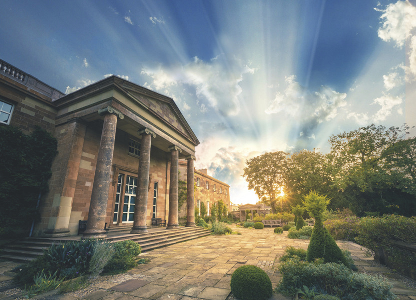 The outside of Hillsborough Castle and its gardens in sunrise