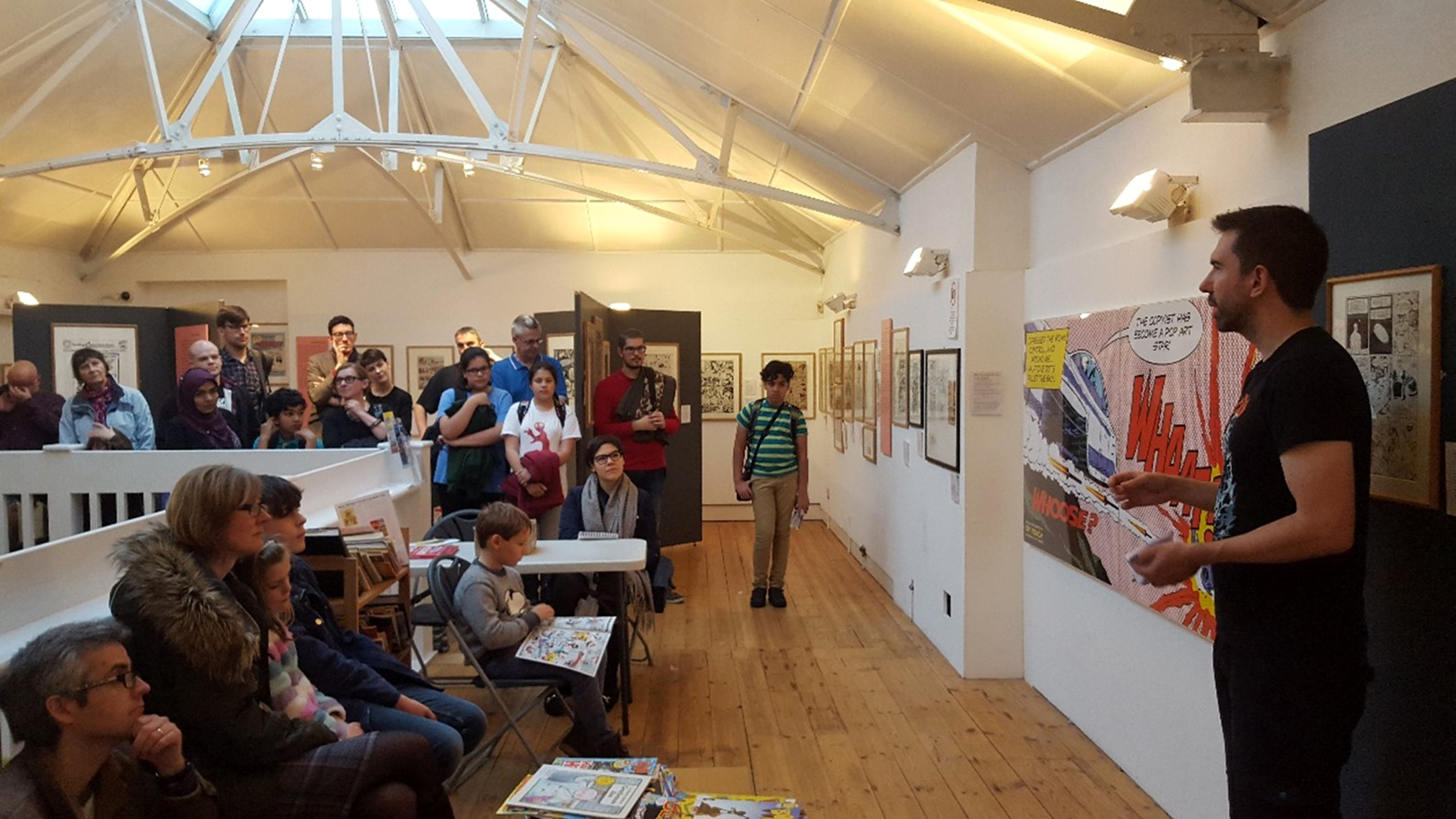 Comic book artist leading an event at the Cartoon Museum