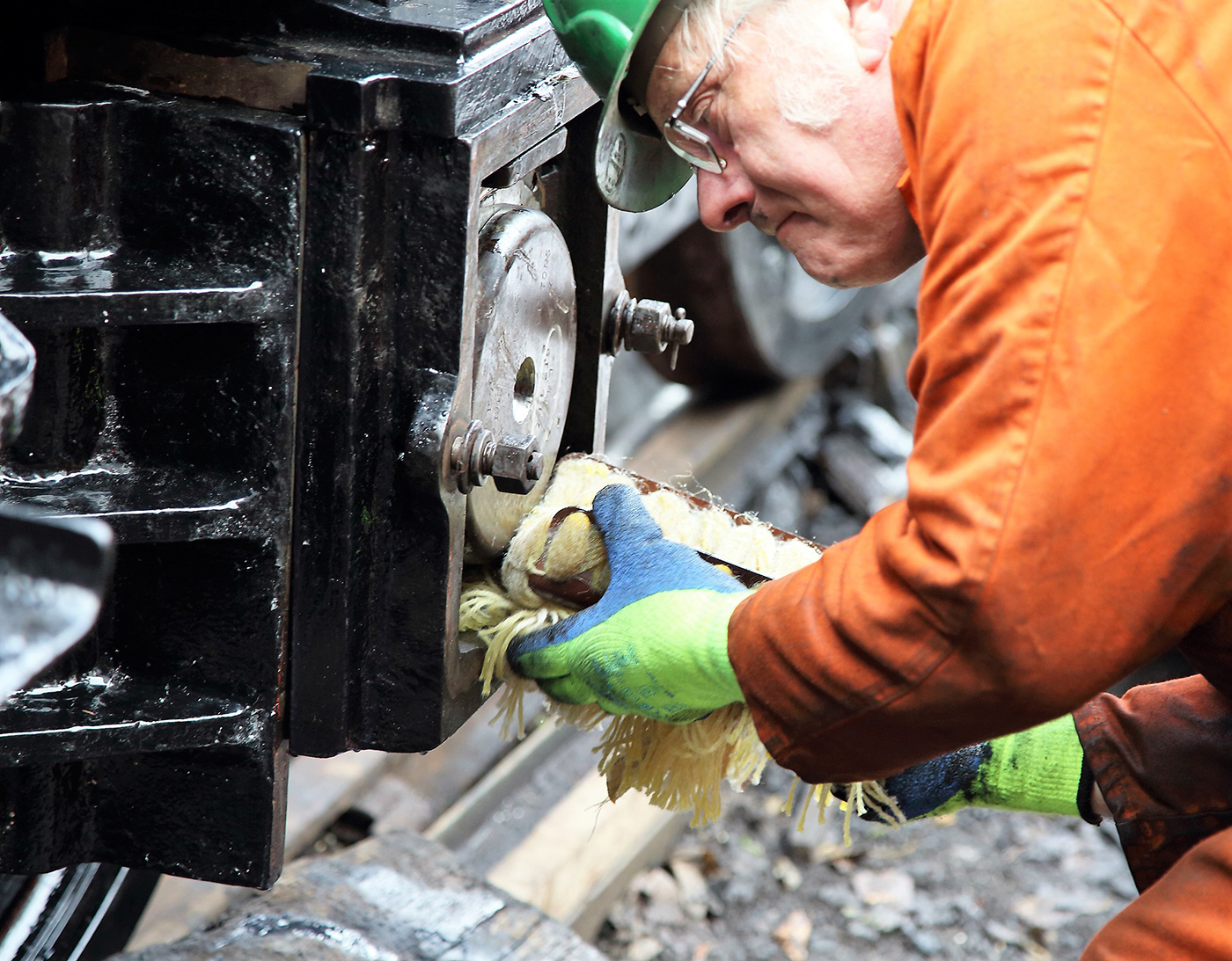 Man working on steam train