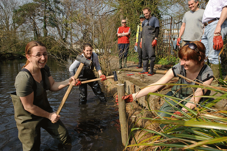 Volunteers making improvements to a riverbank