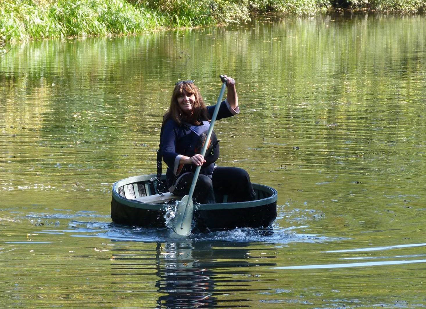 Marion Blockley in a coracle