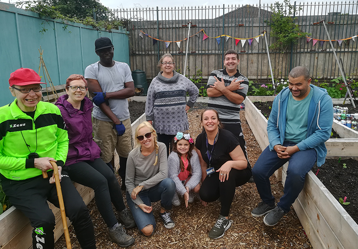 Group of people in a community garden