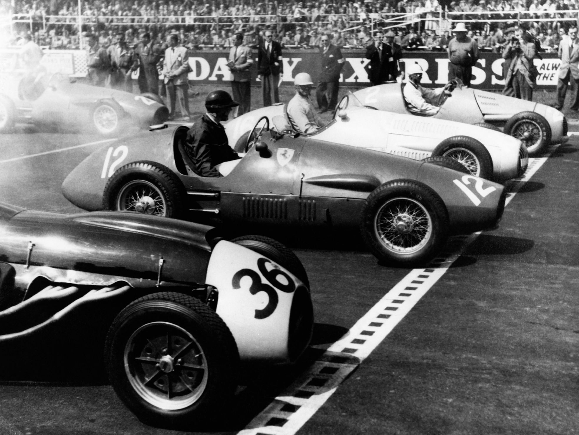 Black and white photograph of vintage cars