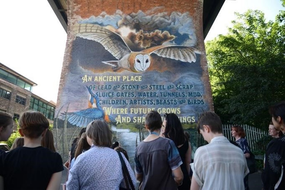 Picture of people viewing artwork by David Almond