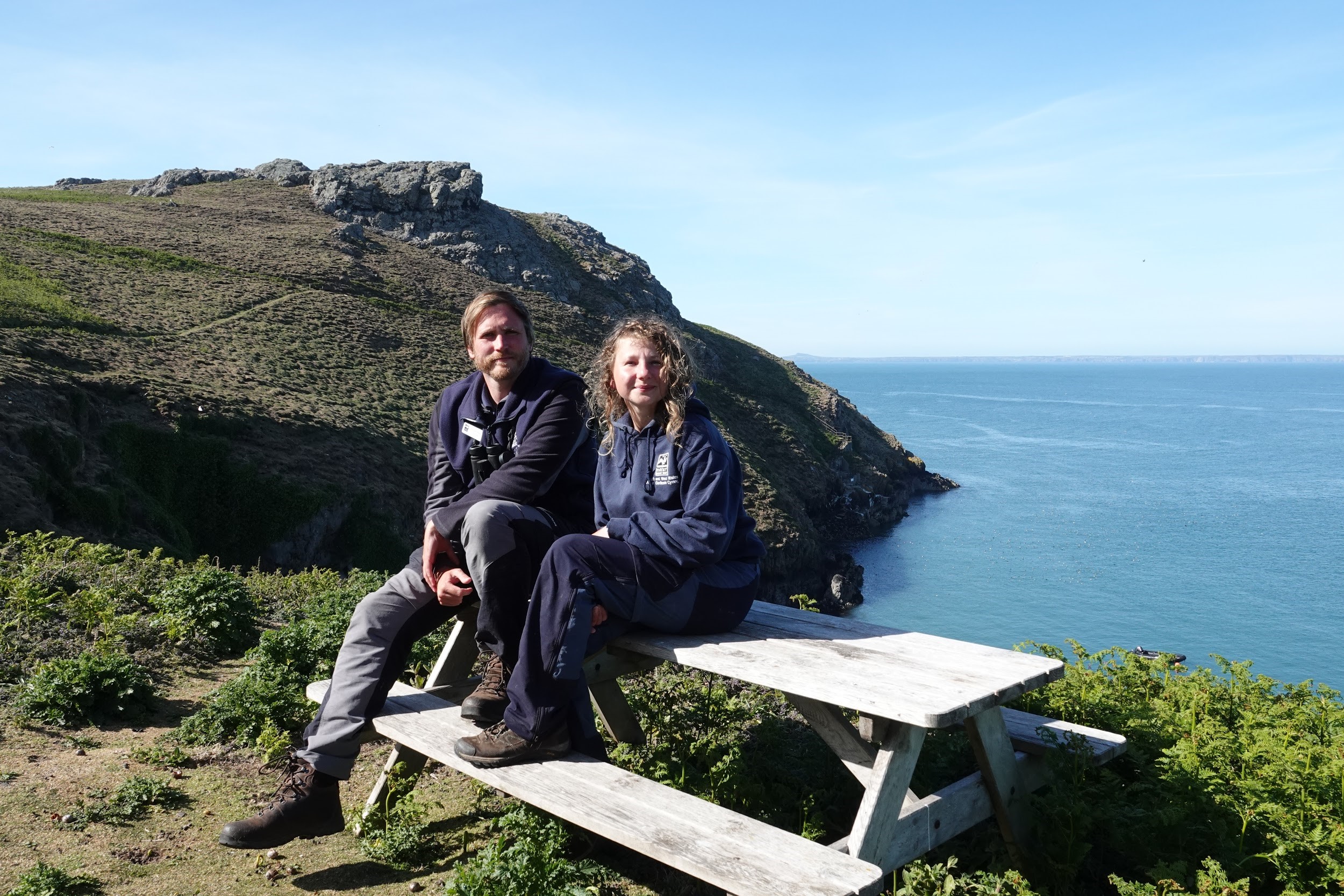 Two people on bench