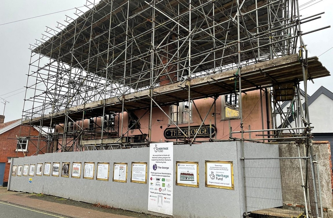 Construction taking place on the pub, scaffolding surrounding the building