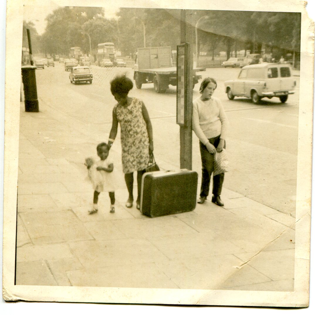 People at a bus stop