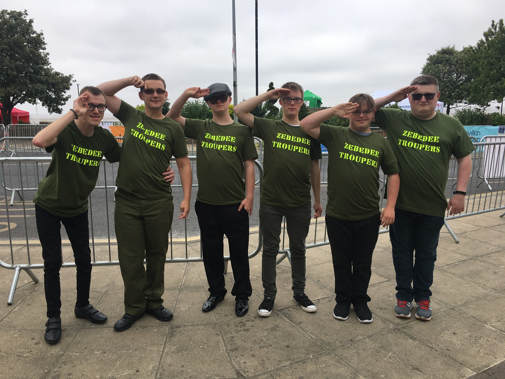 Six young people salute