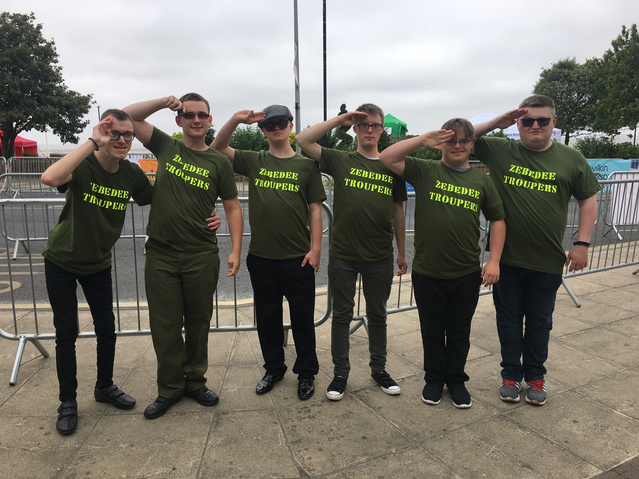 Six young people salute 