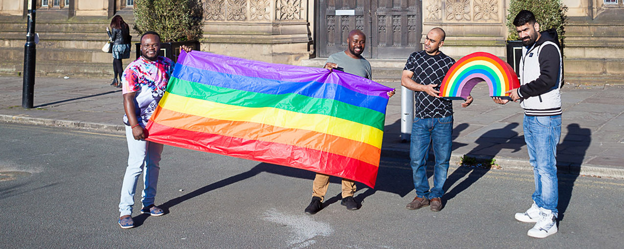 people with rainbow flag