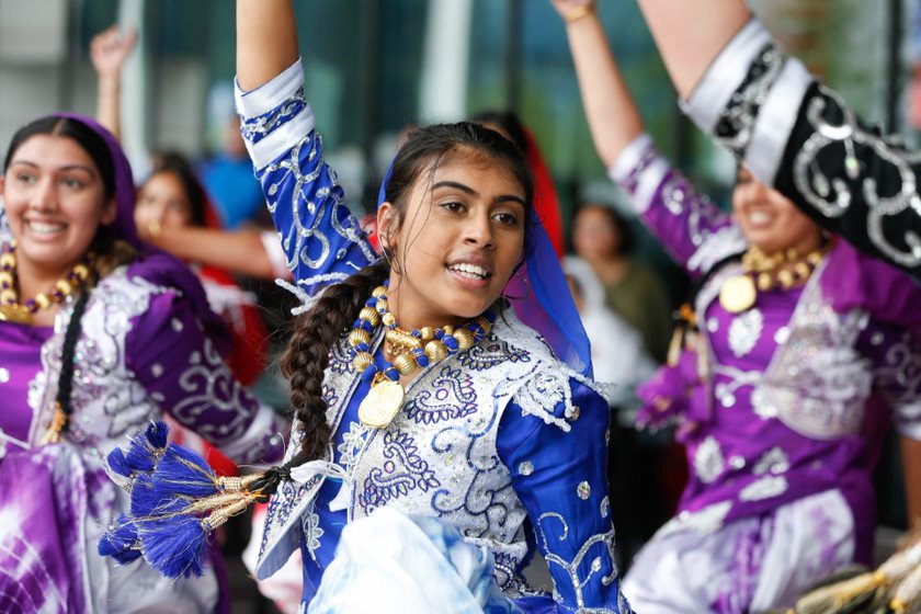 People dancing as part of a cultural festival at the Birmingham Commonwealth games