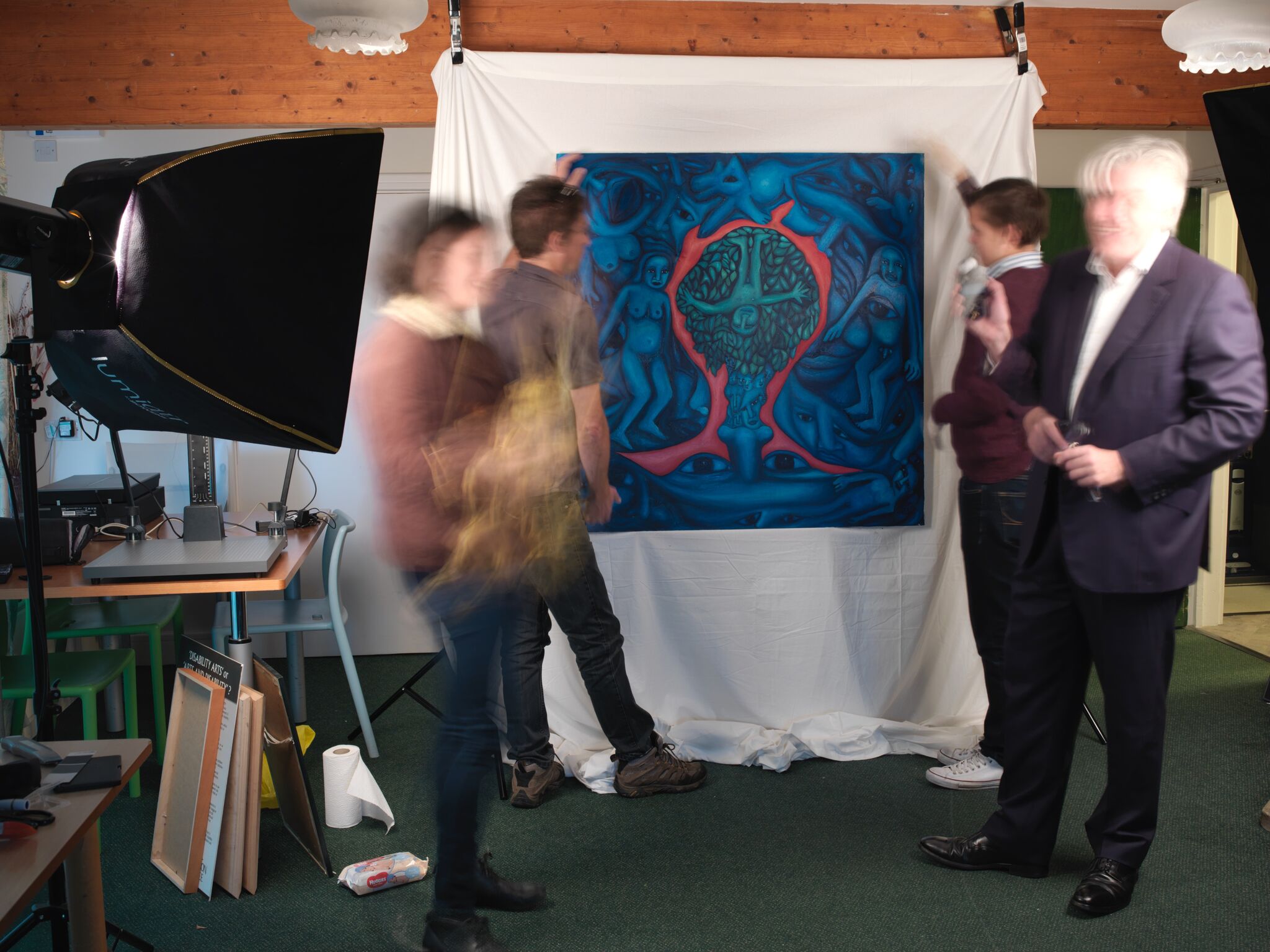 The NDACA project team digitising a Colin Hambrook painting, October 2015 The NDACA project team digitising a Colin Hambrook painting, October 2015