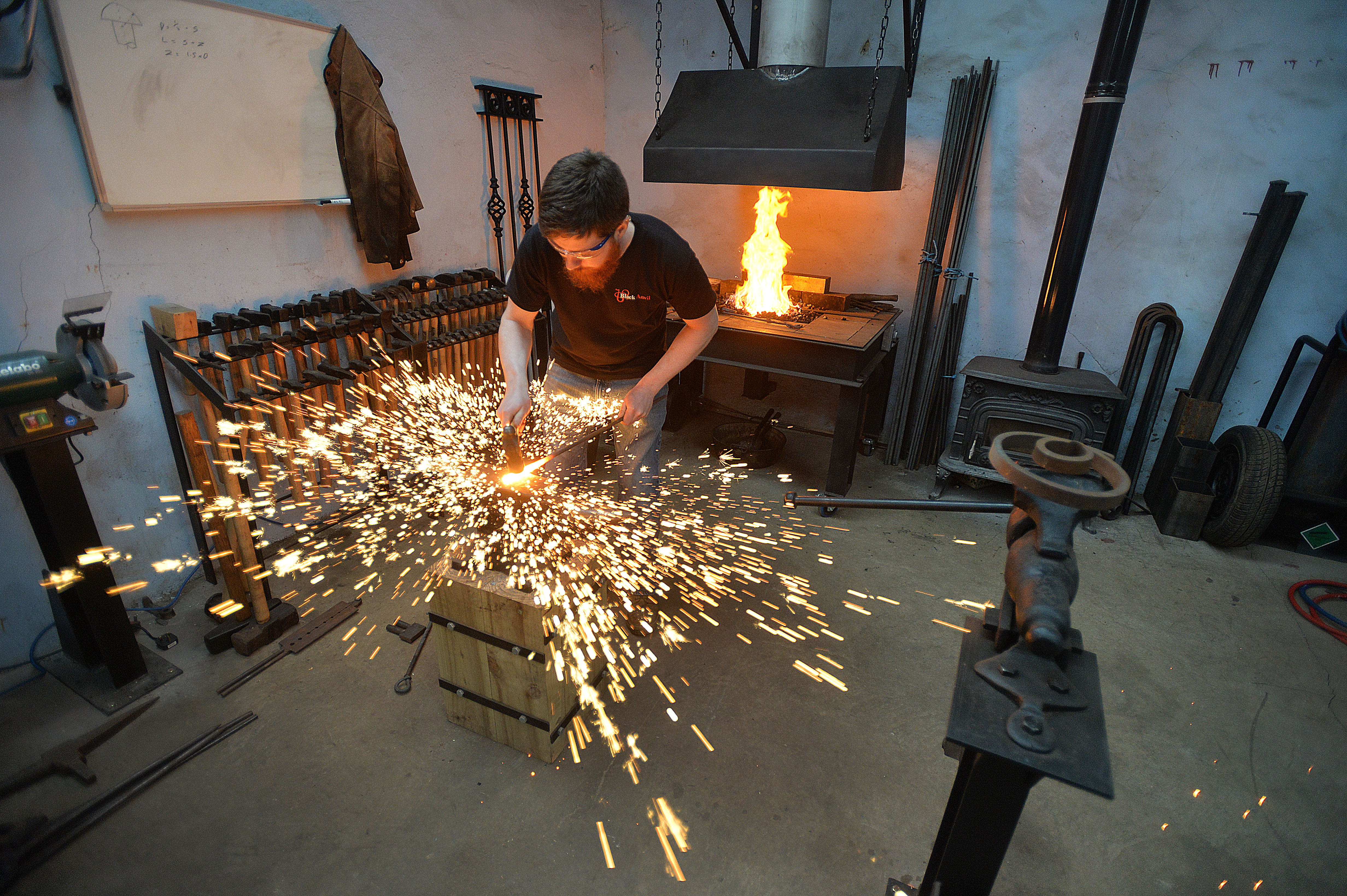 Life-changing: from Belfast welder to heritage blacksmith Owen at work on his anvil