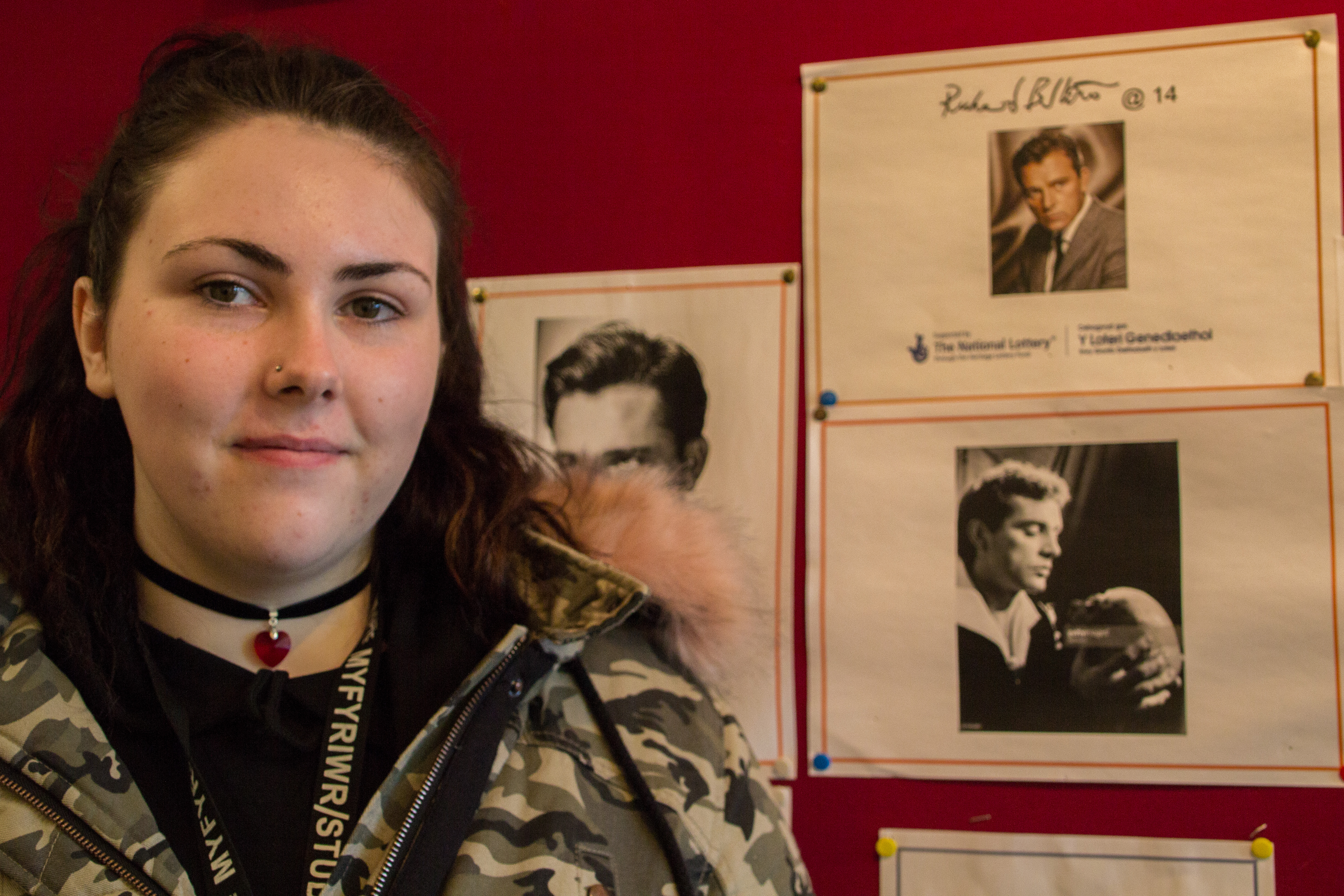 Changing lives: instilling confidence in Port Talbot teens Shania in front of the students' display