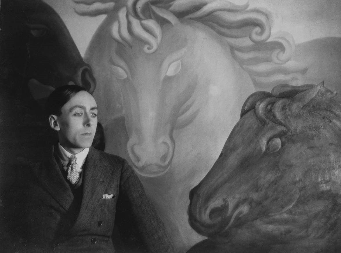 Eddy Sackville-West in front of a painting of horses Eddy Sackville-West in front of a painting of horses