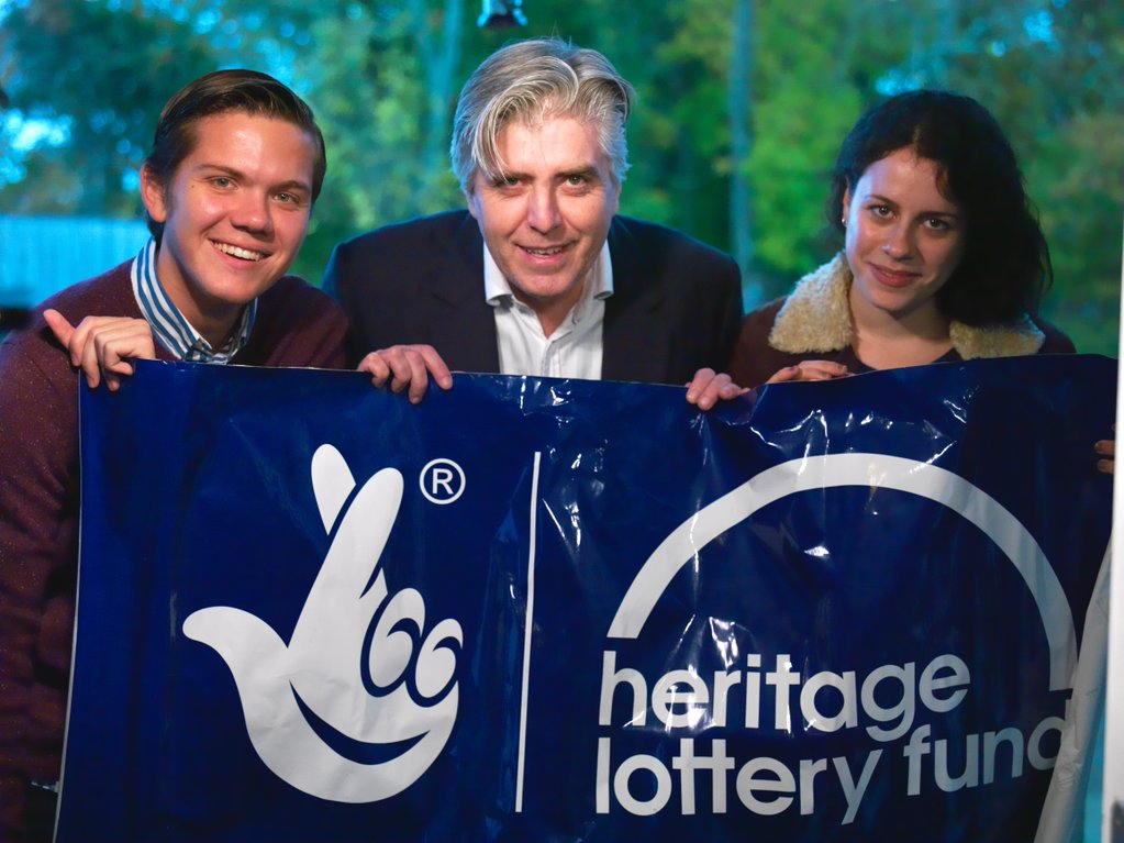 Mike Flack, David Hevey and Georgia Macqueen Black with HLF banner