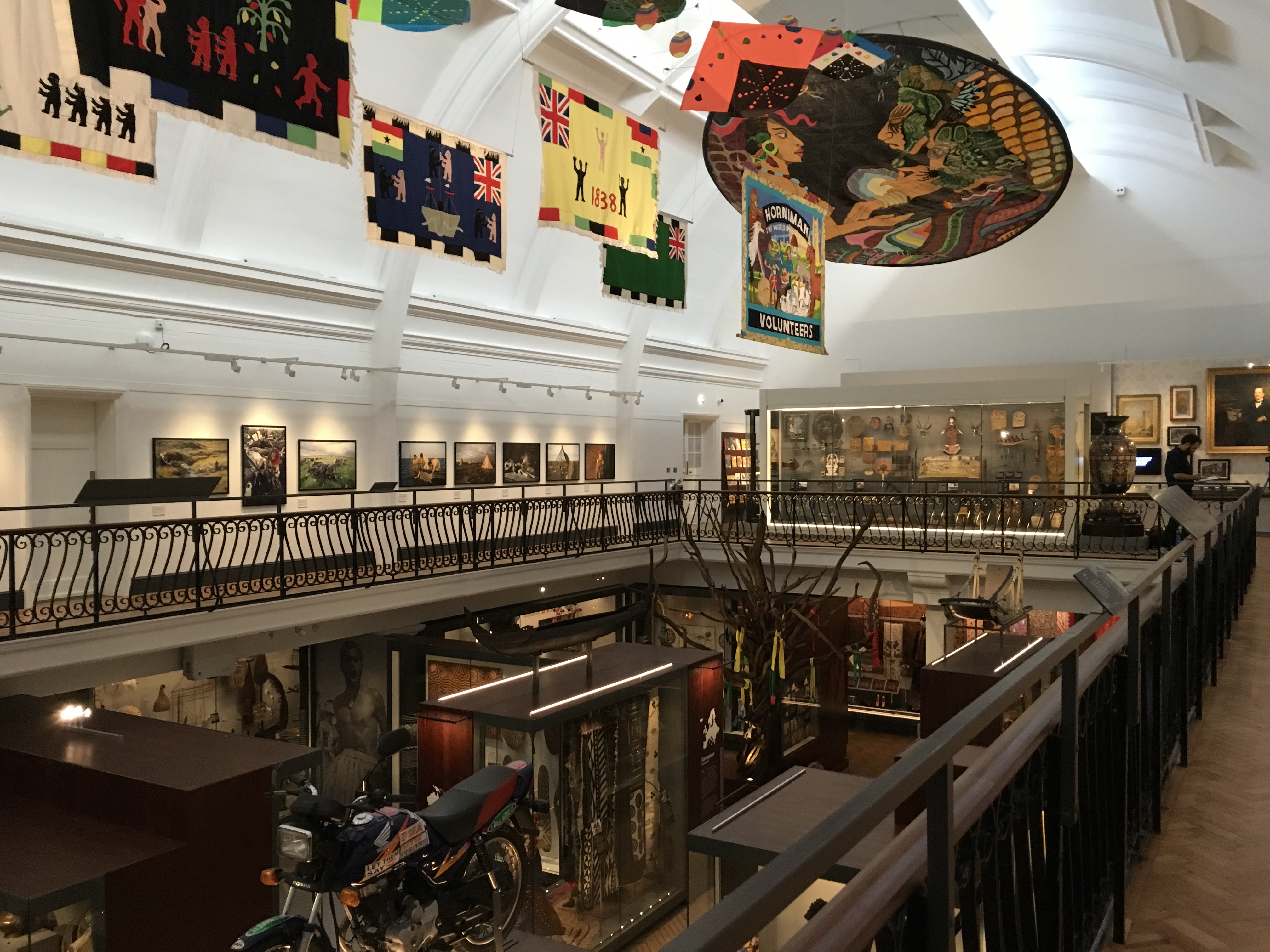Flags and banners from across the world hang above the World Gallery Flags and banners from across the world hang above the World Gallery