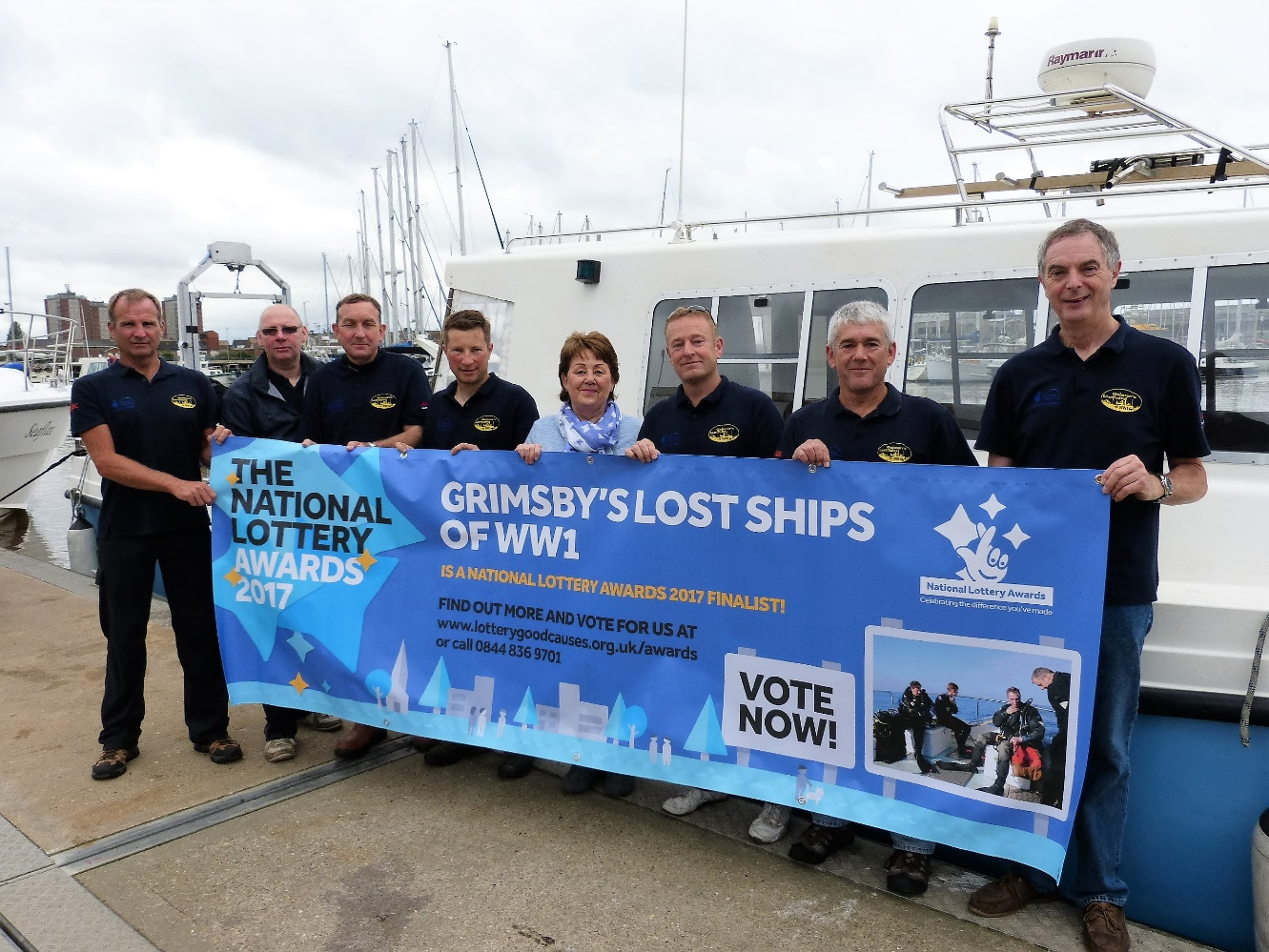 Changing lives: Linda pays tribute to great grandfather Linda with the dive team on the quayside alongside the Humber Heritage boat