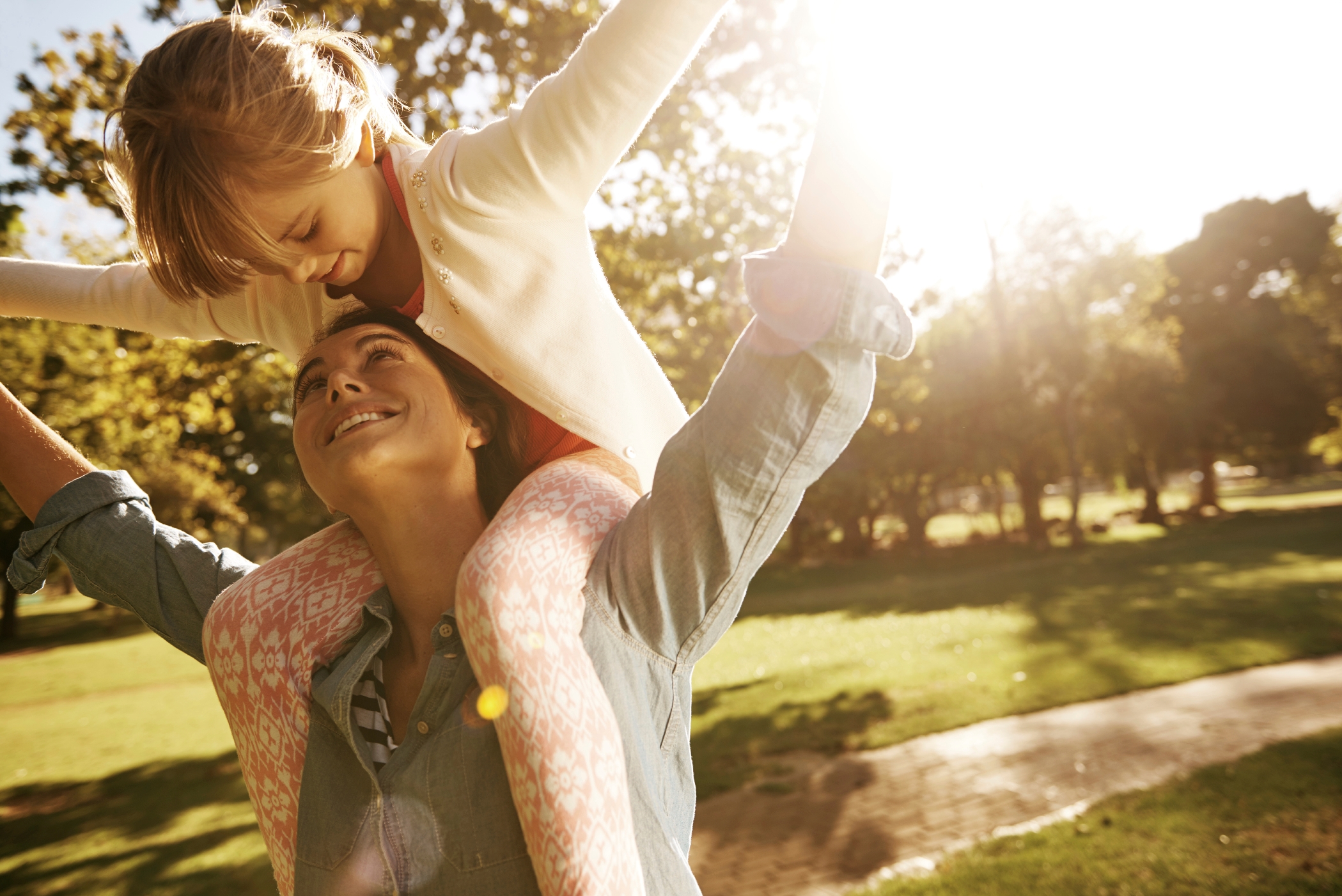 How can we ensure a brighter future for parks? A mother and child have fun in a park
