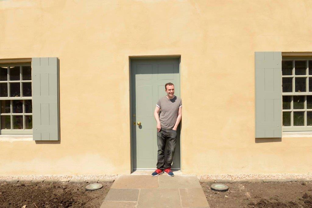 Sutherland Forsyth in front of the Botanic Cottage Sutherland Forsyth in front of the Botanic Cottage