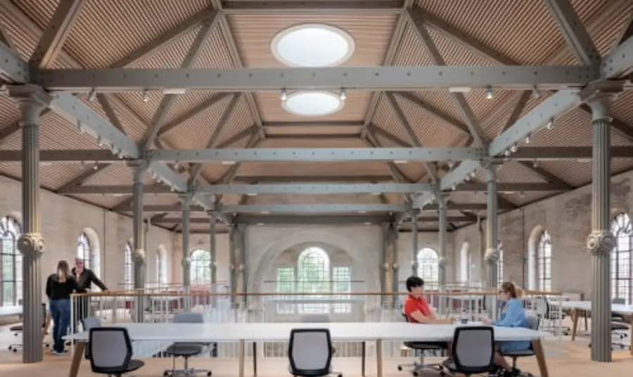 Interior view of the restored Sheerness Dockyard, including seating and office space