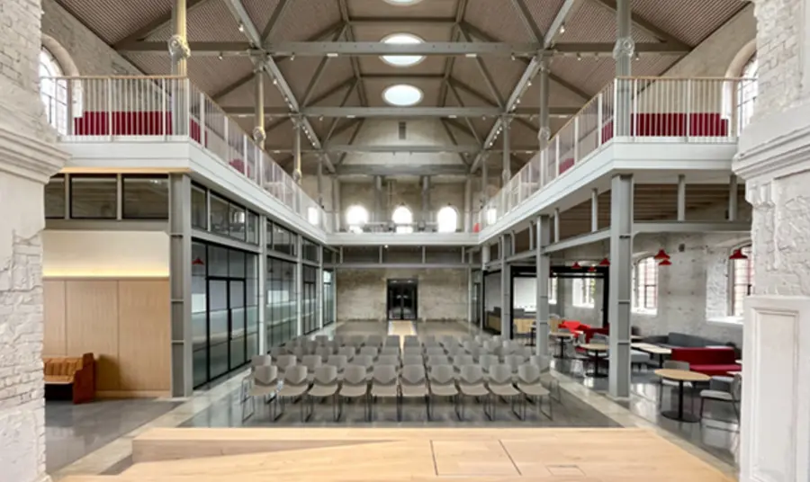 Interior view of the restored Sheerness Dockyard Church, including seating and office space