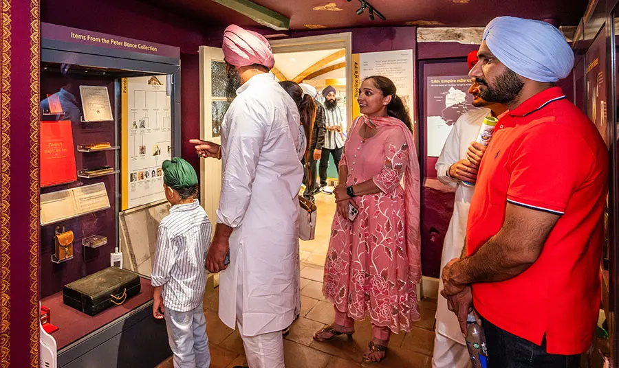 A family looking at a museum display