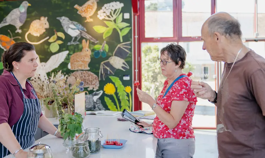 Visitors taste food made with ingredients found in hedgerows at The Food Museum