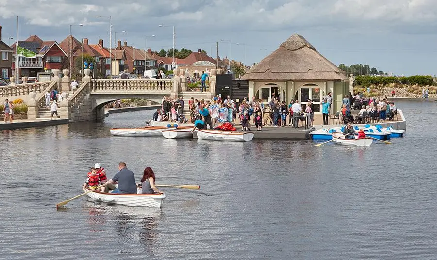 People boating at Great Yarmouth's Venetian Waterways