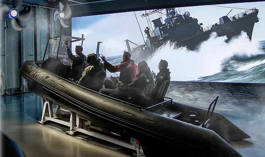 An exciting feature of the planned Experience in Boathouse 6. A visualisation of the future Royal Marines Experience shows a group of visitors enjoying a ride that recreates the experience of being aboard a high-speed inflatable rig.
