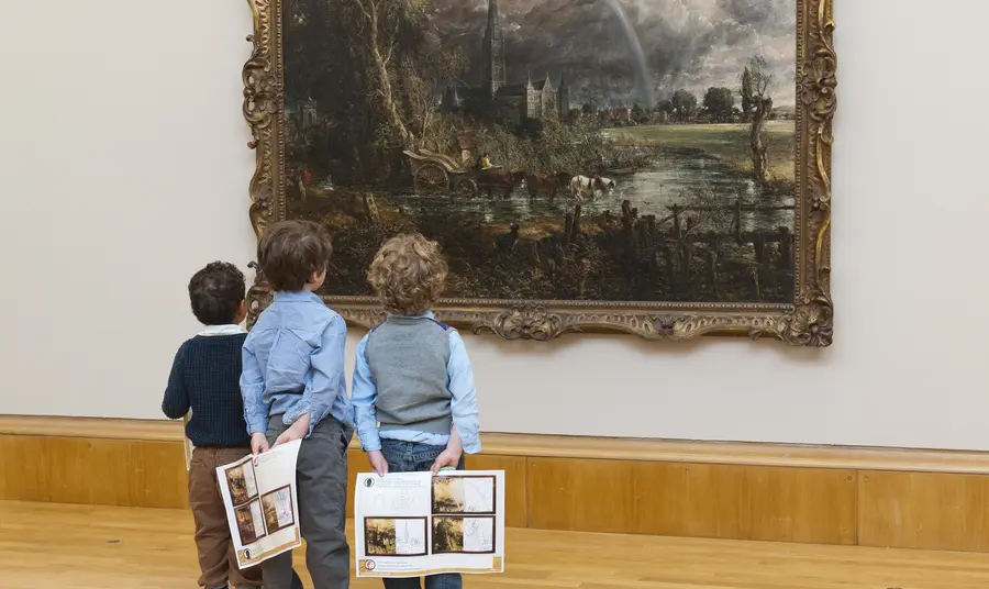 Viewers admiring Constable's painting 'Salisbury Cathedral from the Meadows'