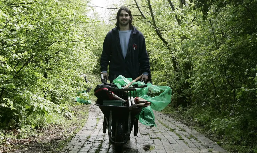 Conservation planning guidance Person pushing wheelbarrow towards camera