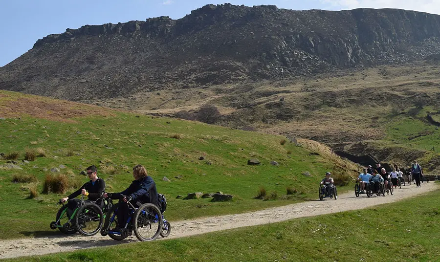 Experience Community CIC wheelchair users enjoying the countryside