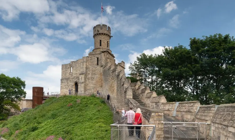 Lincoln Castle ©CMPhotography-4252 (1).jpg People walking up steps to a castle with turret