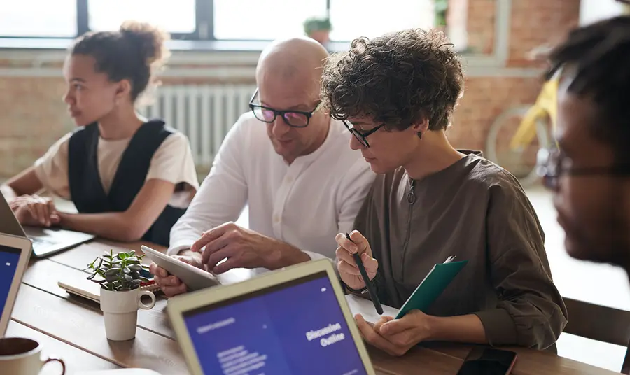 People meeting using computer and tablet