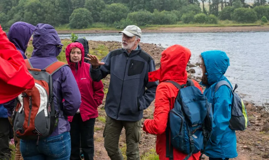 25 years: we share our memories People in anoraks learning about Cairngorms