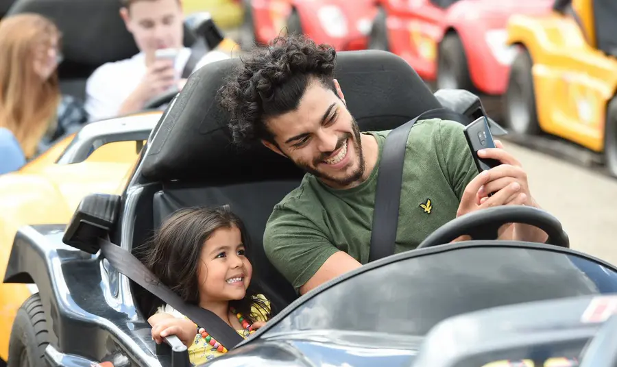 Two people in fairground ride