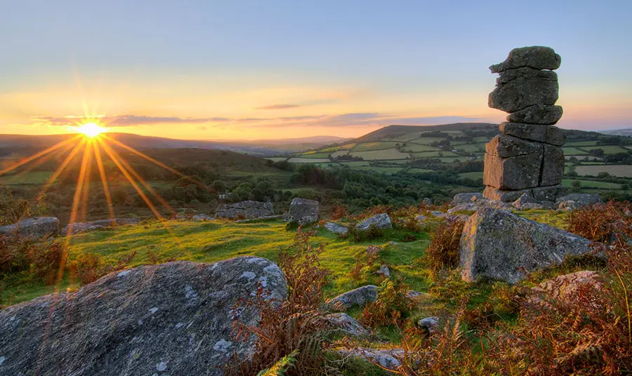 Sun setting at the iconic Bowerman's Nose in Dartmoor
