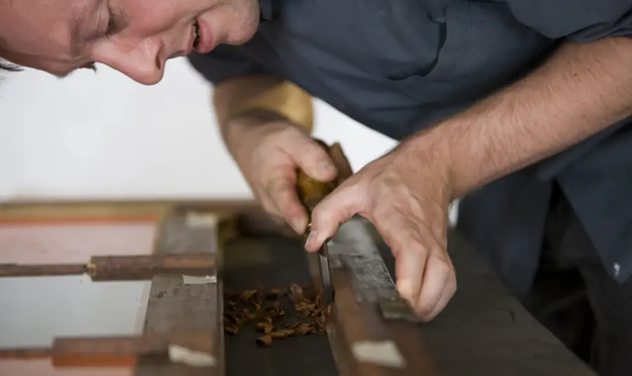 Covid Recovery Programme for Heritage Individuals (Northern Ireland) Person using large tools