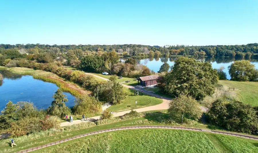 Management and maintenance plan guidance for landscapes, parks and gardens View of landscape with lakes, grass and trees