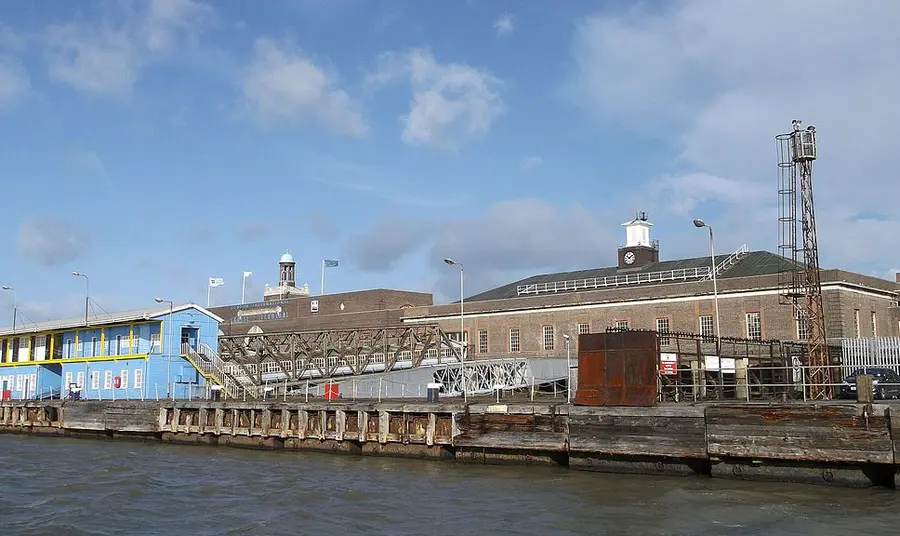 Dockside buildings under a blue sky